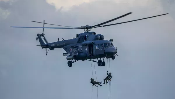 Russian Helicopters Conduct Tactical Landing Drill in Tajikistan During Center-2026