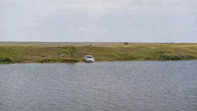Two Sisters Die After Car Rolls Into Flooded Quarry Near Kazakhstan's Astana