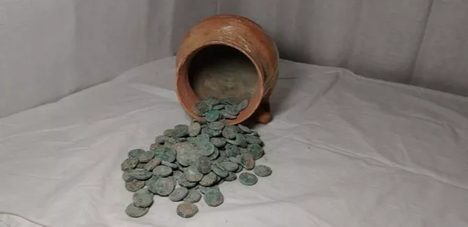 Archaeologists Reveal Kushan-Era Coin Hoard in Tajikistan