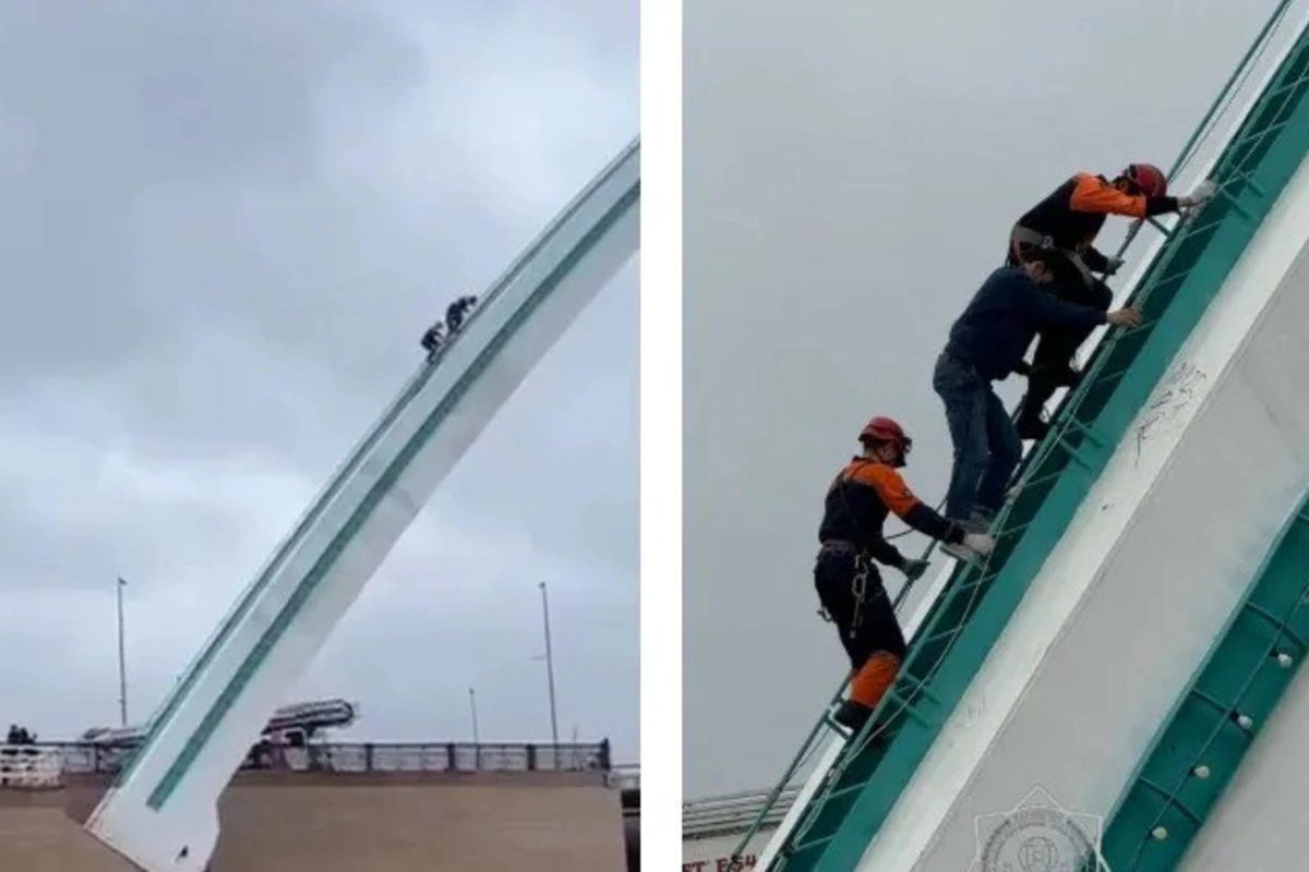 A Man Climbed Onto the Arch of the Karaotkel Bridge in Astana