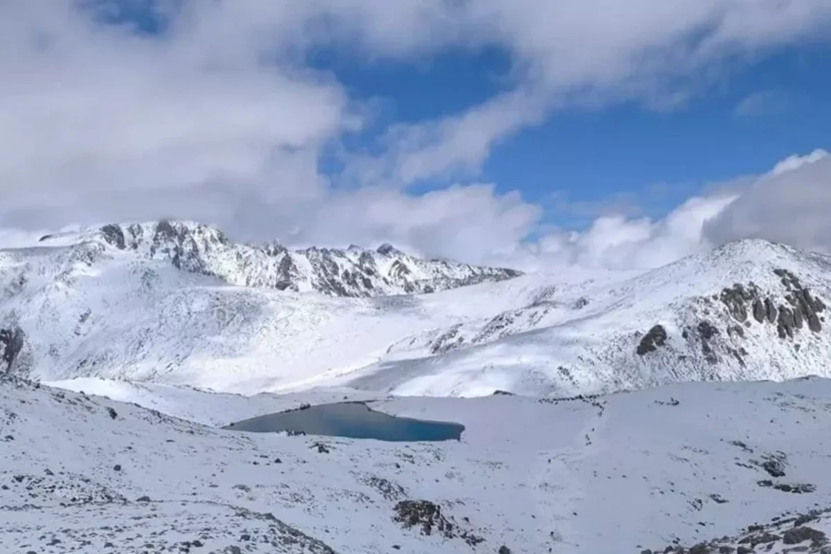 September Snow Transforms East Kazakhstan Mountains into Winter Wonderland