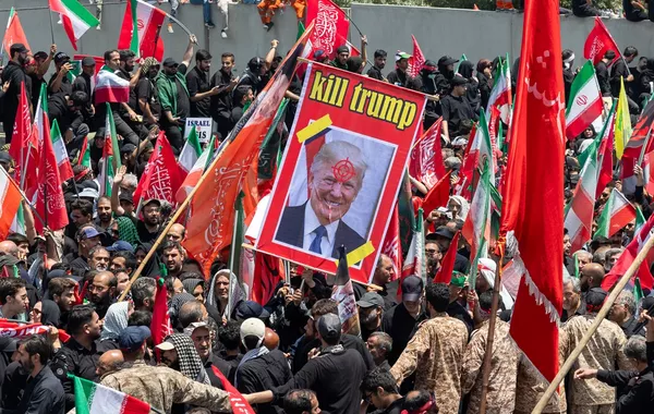 Crowd Hurls Stones at Trump's Portrait During Iranian Ritual