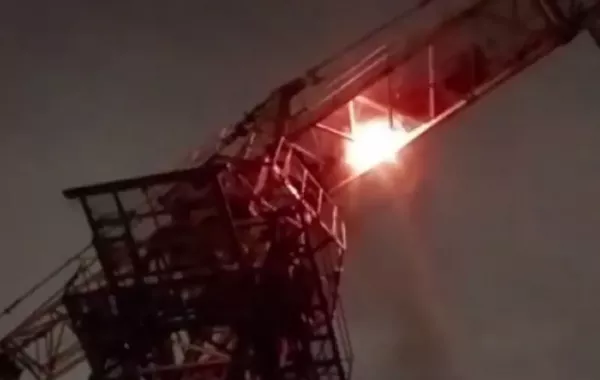 Tower Crane Catches Fire at Construction Site in Kazakhstan - VIDEO