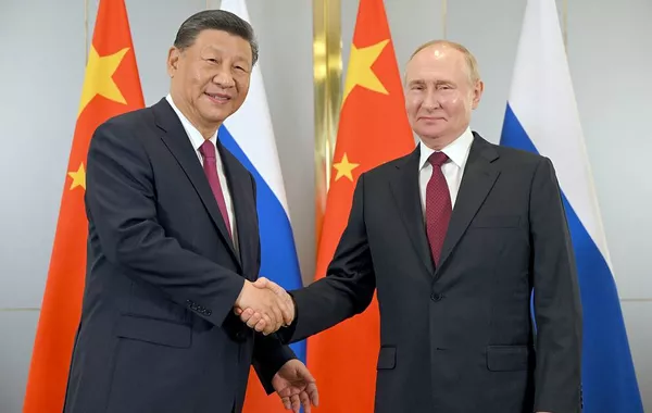 Putin, Xi to Hold Informal Talks in Beijing