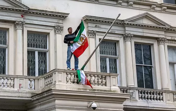 Protester Replaces Iranian Flag at Embassy in London
