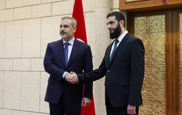 Turkish Foreign Minister Holds Talks with Syrian President During US Visit