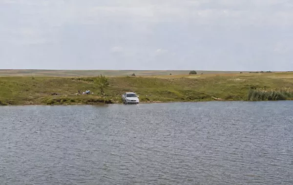 Two Sisters Die After Car Rolls Into Flooded Quarry Near Kazakhstan's Astana