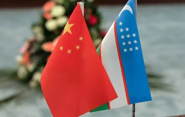 Chinese FM Meets Uzbek Counterpart in Tianjin