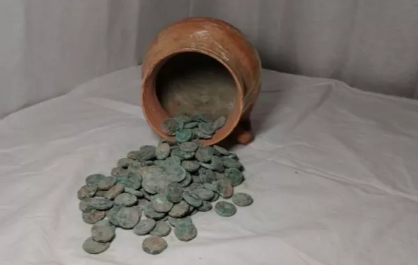 Archaeologists Reveal Kushan-Era Coin Hoard in Tajikistan